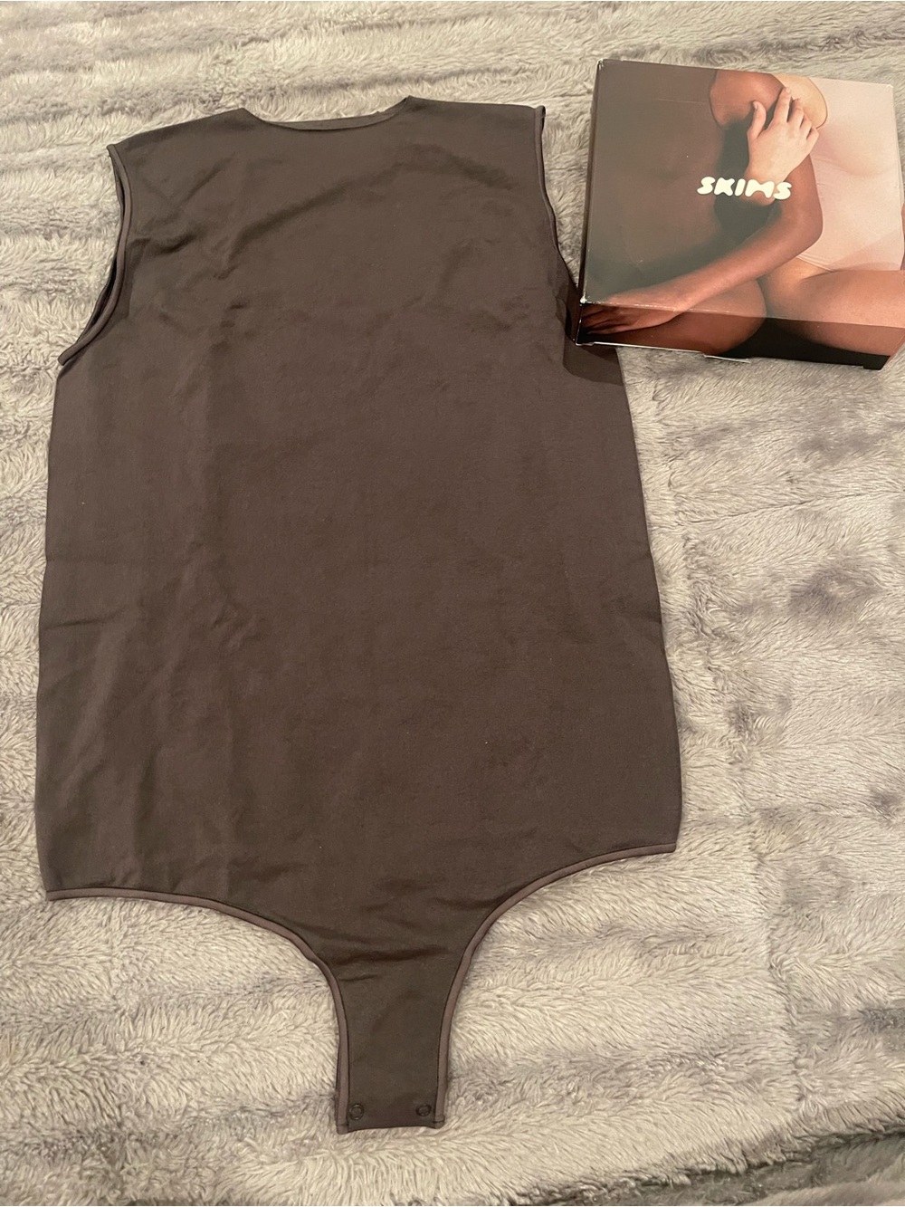 SKIMS Essential Crewneck Sleeveless Thong
Bodysuit